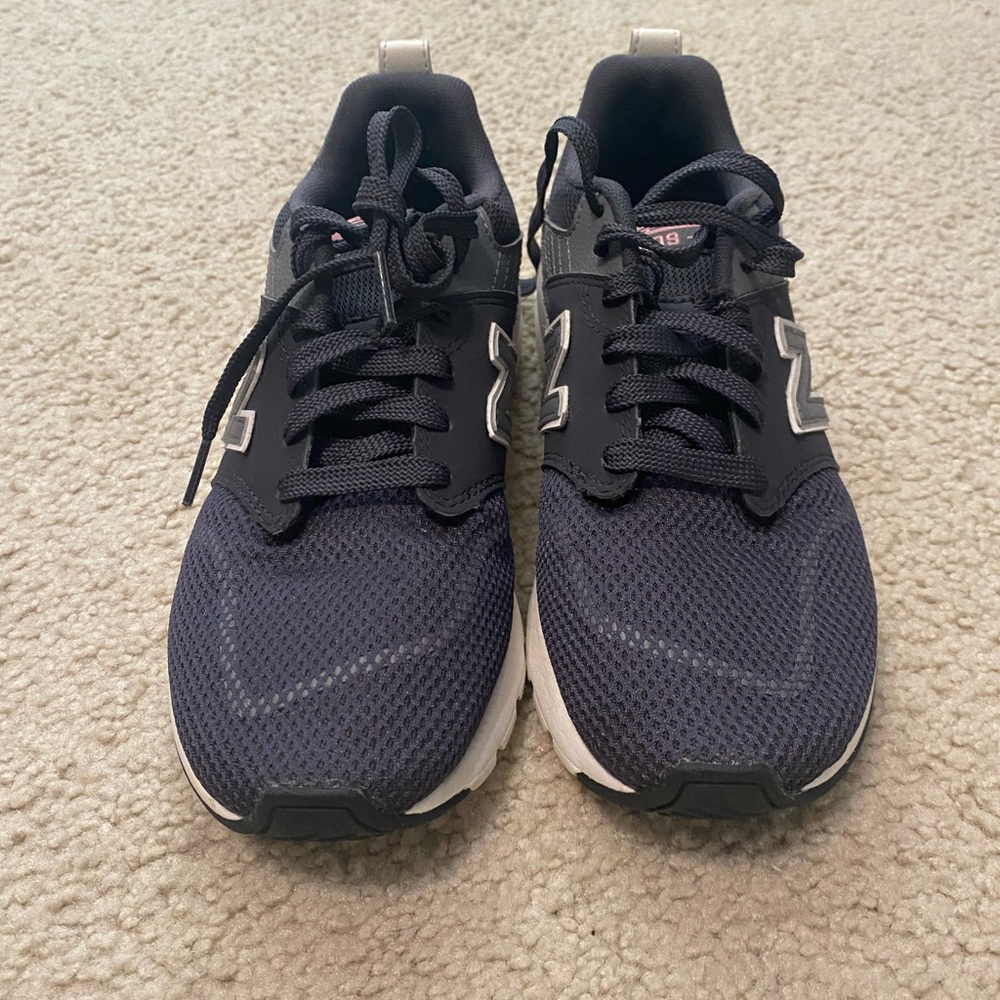 New Balance sneakers with comfort insert.